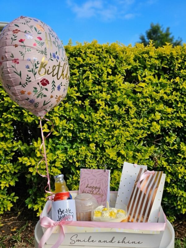 Smile and Shine Tray: tray with a Be Happy mug, cheesecake, juice and a floral balloon